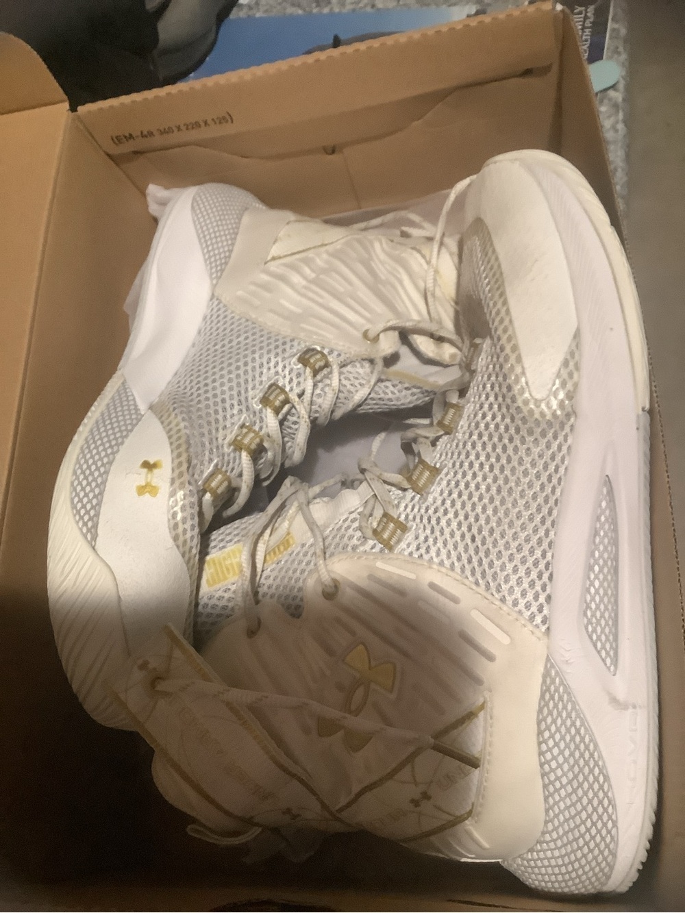 Under Armour White Sneakers with Gold Accents